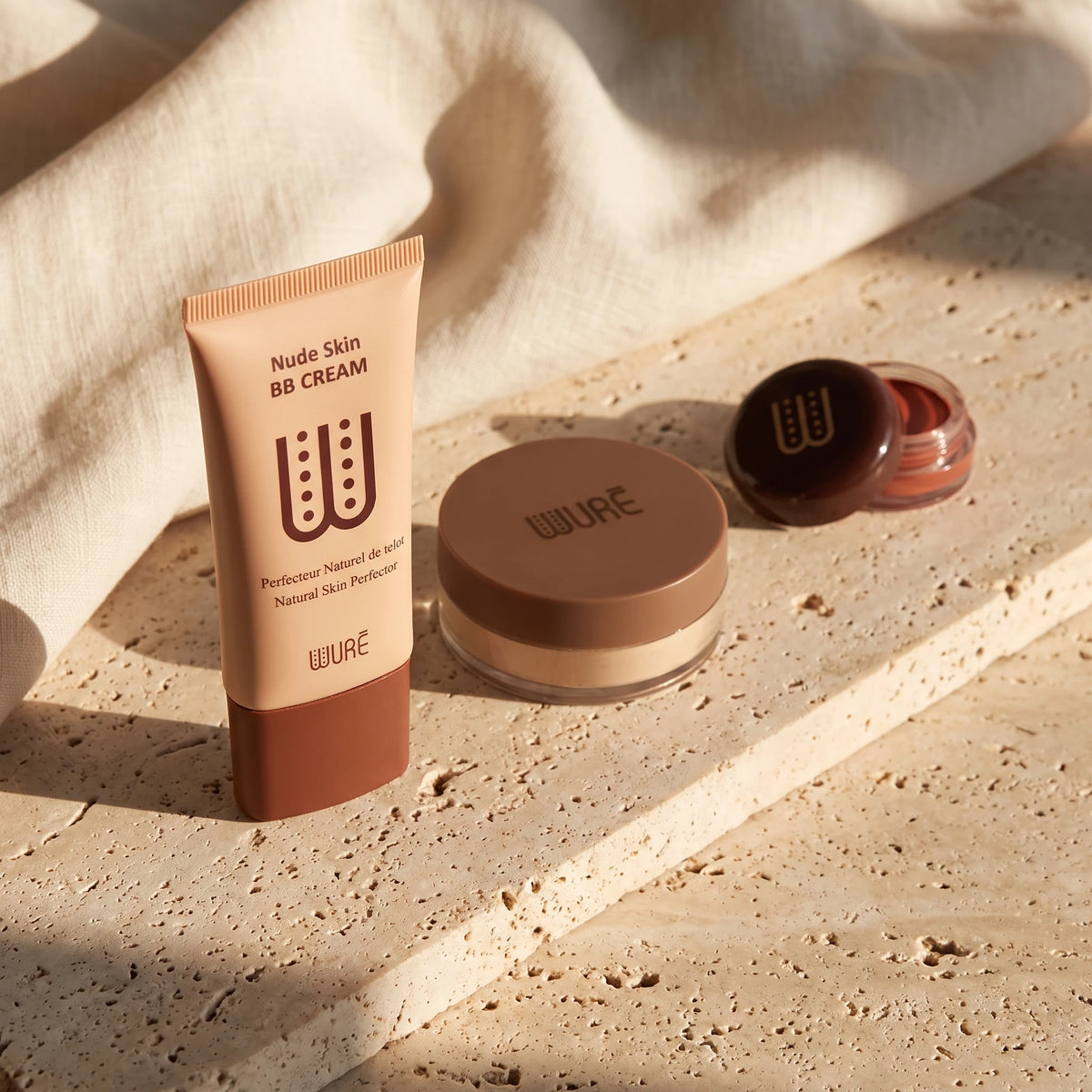 Trio Les essentiels Wuré, travertin lumière rasante