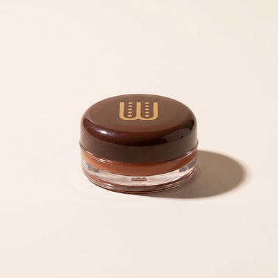 Baume teinté All In One Wuré, packshot sur fond crème