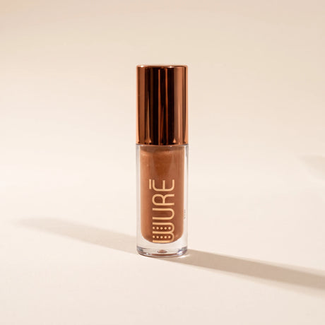 Huile à lèvres teintée Wuré, packshot sur fond crème